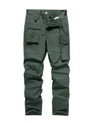 Men's green functional cargo pants with multiple pockets and buckle details.