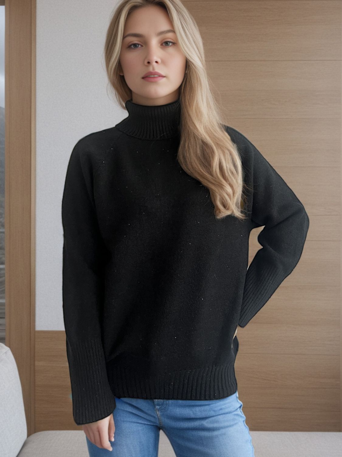 Black ribbed turtleneck sweater with subtle sparkle detail and ribbed cuffs and hem.