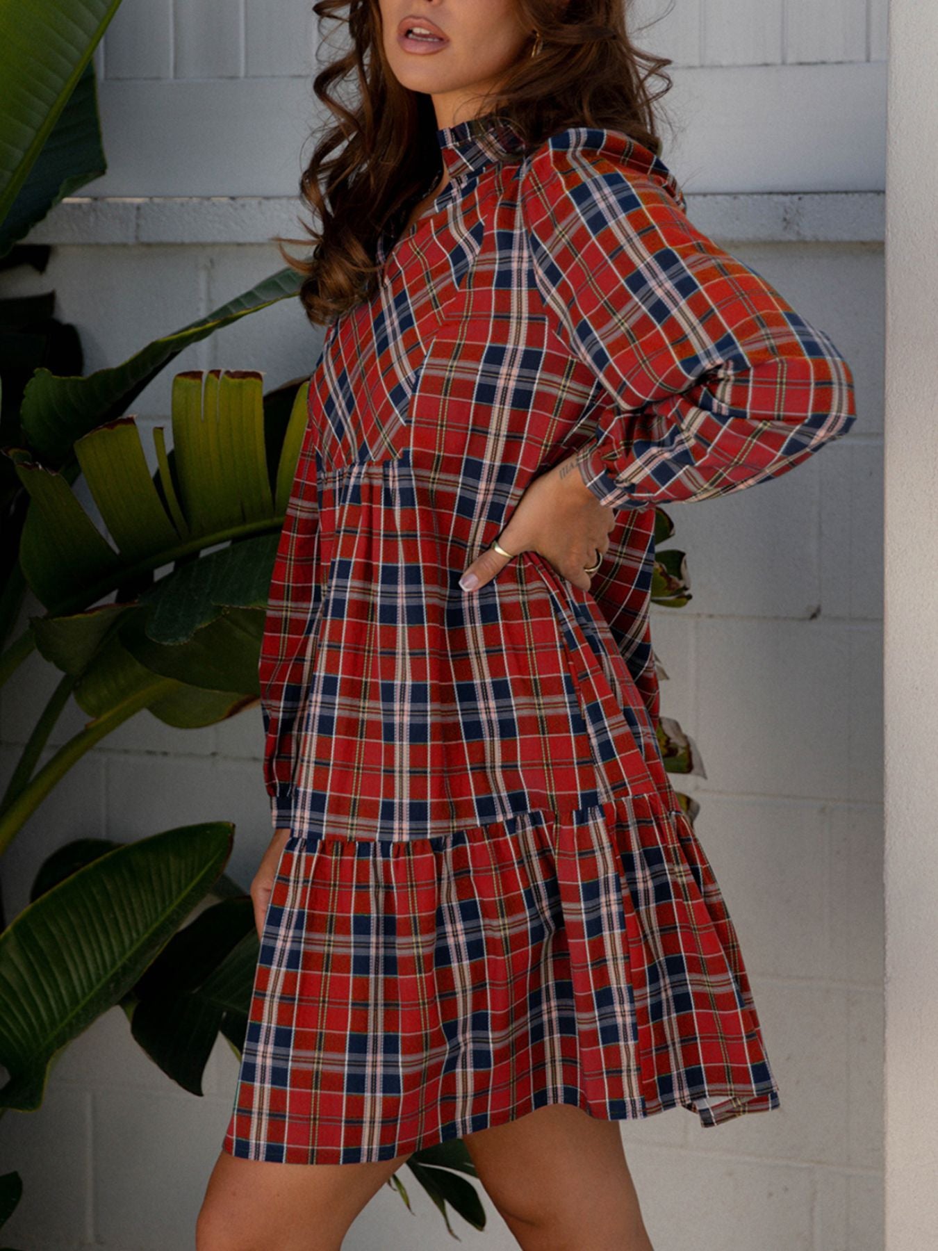 Tartan mini dress with frilly collar and tiered skirt.