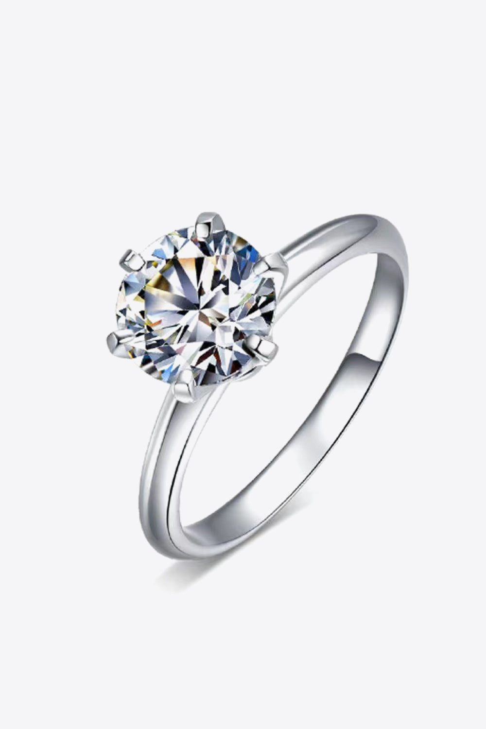 Silver ring with a brilliant cut moissanite solitaire stone