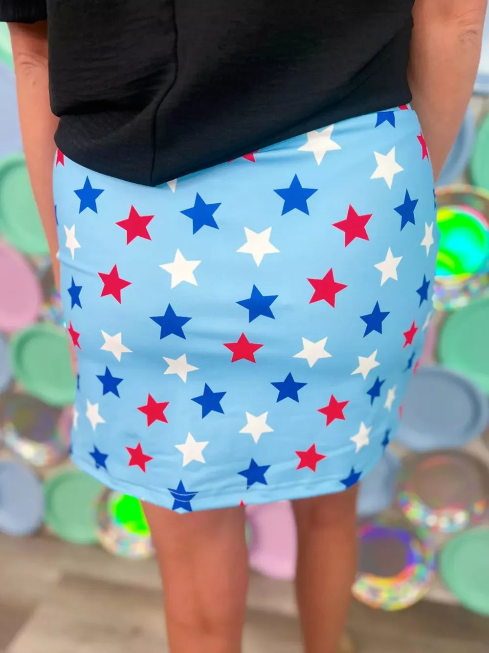 Starry drawstring mini skort with pockets in blue with red and white stars