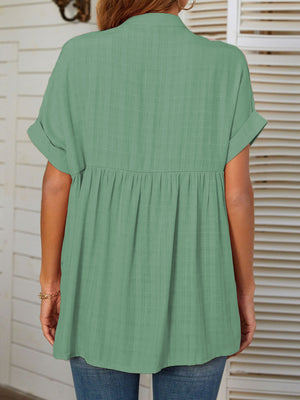 Gathered yoke linen blend blouse in Gum Leaf green with short rolled sleeves and a babydoll cut.
