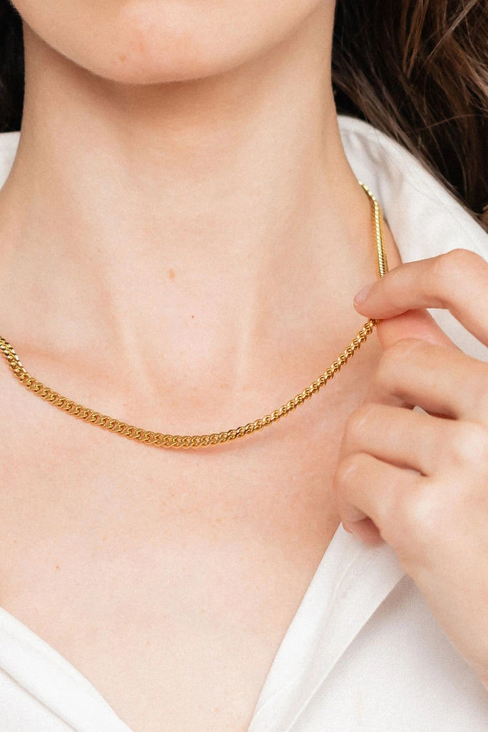Gold chain necklace with a sculpted link design, 18K gold-plated
