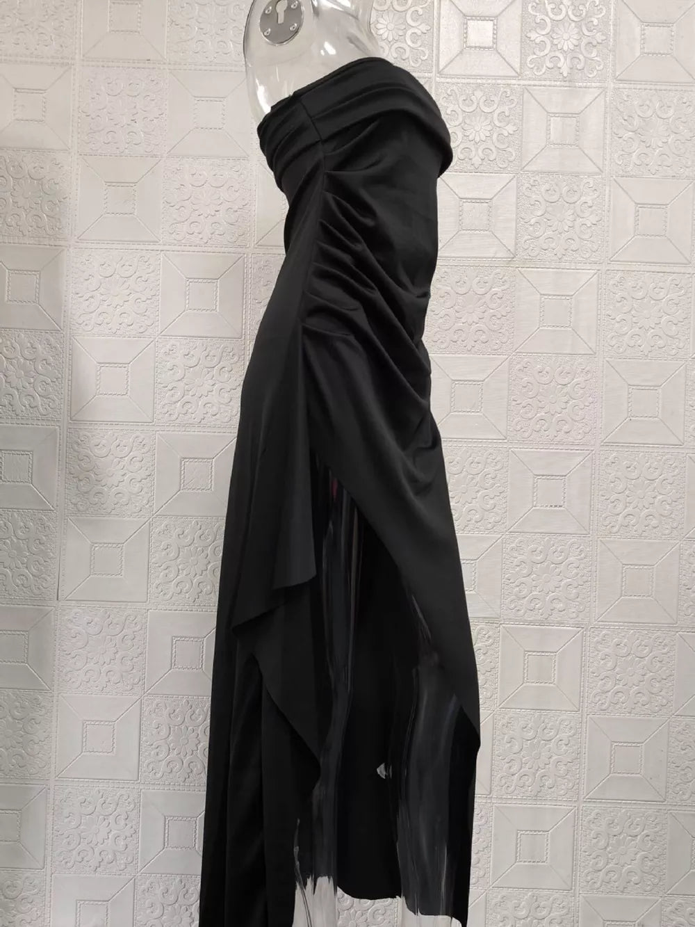 Black strapless maxi dress with ruching detail and high slit