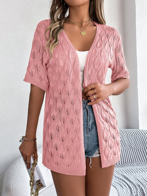 Open-knit leaf motif cardigan in watermelon pink with short sleeves and a V-neck.