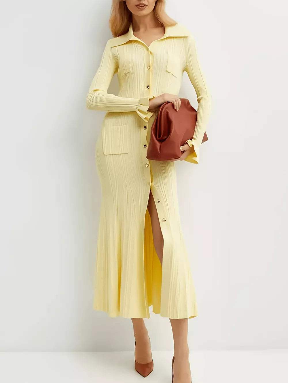 Yellow ribbed knit polo collar sweater dress with button front and pockets, midi length.