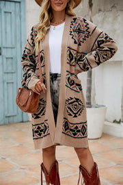 Southwestern geometric knit cardigan in khaki with black, pink, blue, and yellow accents, featuring pockets.