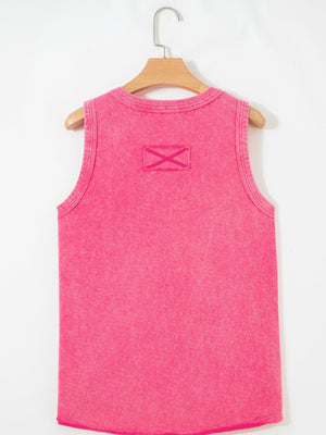 Textured cotton tank top in bright pink with a small X detail on the back yoke.