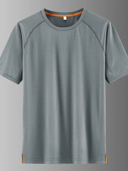 Men's grey quick-dry active t-shirt with round neck and orange trim details.