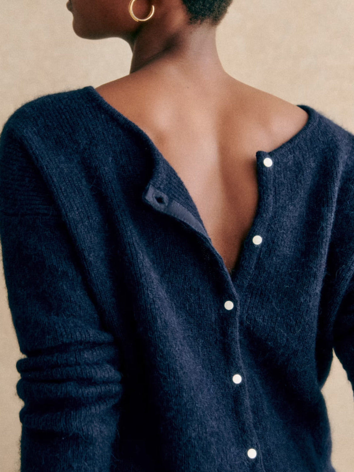 Dark Blue cashmere cardigan with button front and plunging neckline detail.