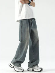 Relaxed wide-leg jeans in vintage blue denim with a comfortable fit.