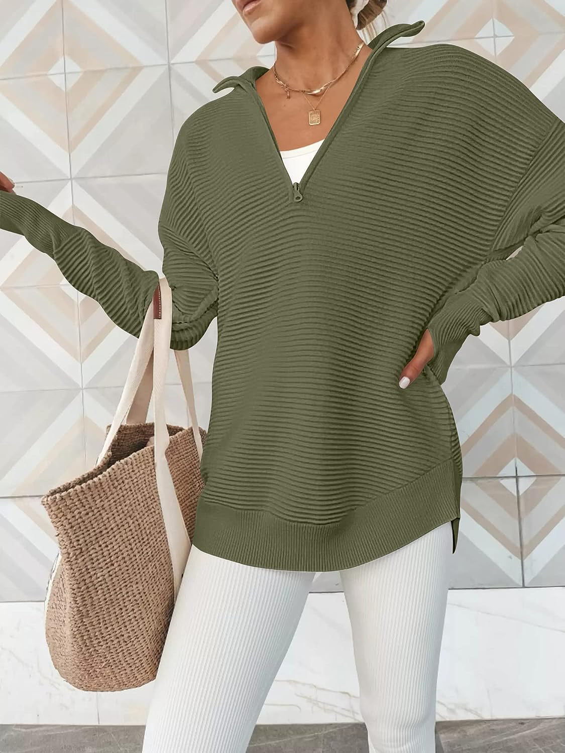Moss ribbed knit pullover with funnel neck and quarter zip, long sleeves, relaxed fit.