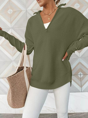 Moss ribbed knit pullover with funnel neck and quarter zip, long sleeves, relaxed fit.