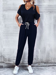 Dark blue cold-shoulder jumpsuit with drawstring waist and v-neck
