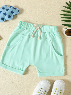 Light Green baby shorts with drawstring waist and pockets.