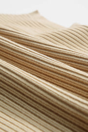 Caramel ribbed knit mock neck top showing texture detail