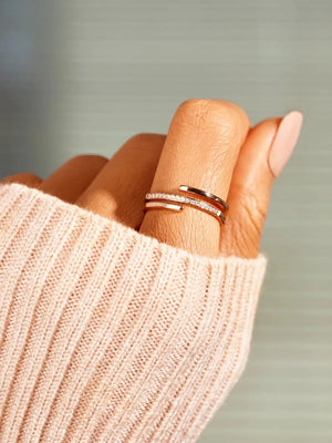 Rose gold double band ring with pave zirconia detail on one band