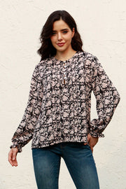 Black floral print keyhole blouse with ruffle cuffs and long sleeves