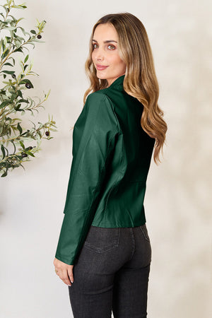 Biker-inspired faux leather jacket in green with a stand-up collar and long sleeves.