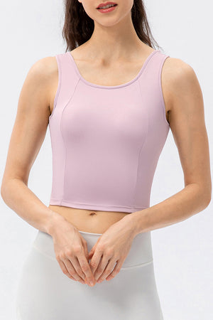 Lilac active crop top with sculpted seams and a scoop neckline.
