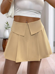Tan collar-waist pleated skort shorts with a high rise and a flattering A-line cut.