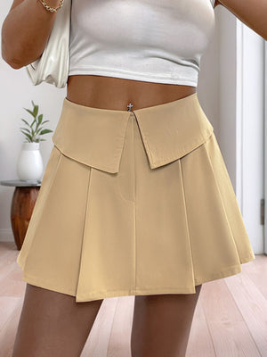 Tan collar-waist pleated skort shorts with a high rise and a flattering A-line cut.