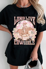 Black graphic tee with a cowgirl riding a horse design and floral accents.