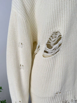 Off white distressed cotton sweater with deconstructed details and frayed edges.