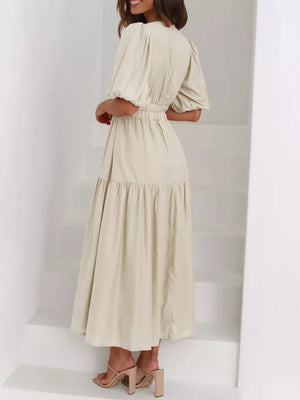 Elegant Puff Sleeve V-neck Midi Dress in Black, close-up detail
