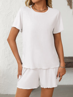 White ribbed loungewear set with raw edge details on t-shirt and shorts.