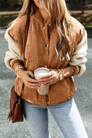 Corduroy bomber jacket in Terracotta with sherpa sleeves and contrast trim.