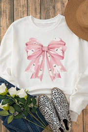 White crewneck sweatshirt with a pink bow graphic adorned with cute ghosts.