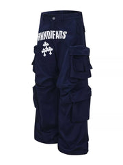 Navy blue cargo pants with white graphic design and multiple pockets.