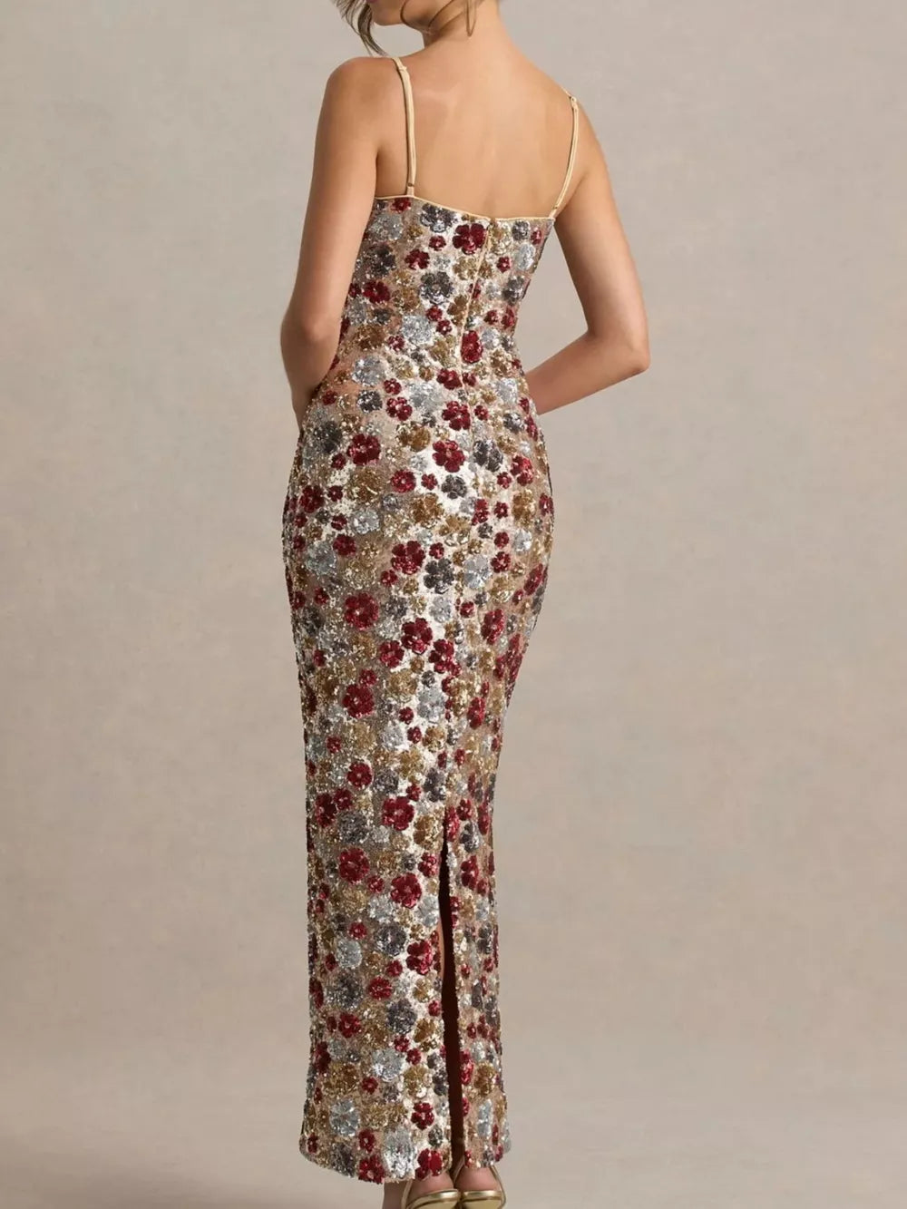 Floral sequin maxi dress with spaghetti straps and a thigh-high slit.