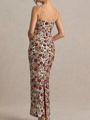 Floral sequin maxi dress with spaghetti straps and a thigh-high slit.