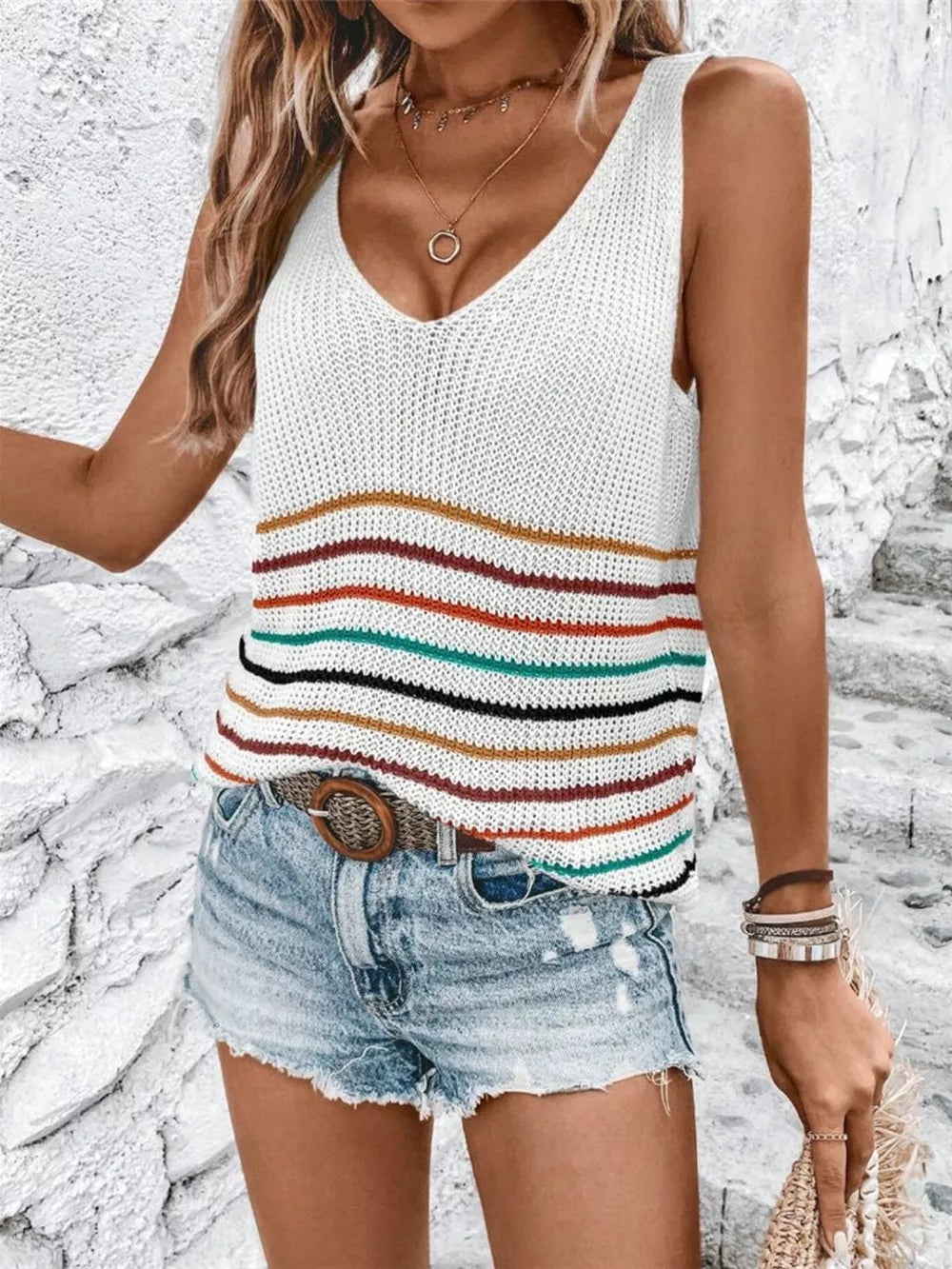 Chic striped V-neck knit vest in white with colorful stripes, acrylic, sleeveless.