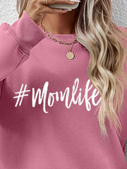 Blush pink crewneck sweatshirt with white #Momlife graphic, crew neck, long sleeves.
