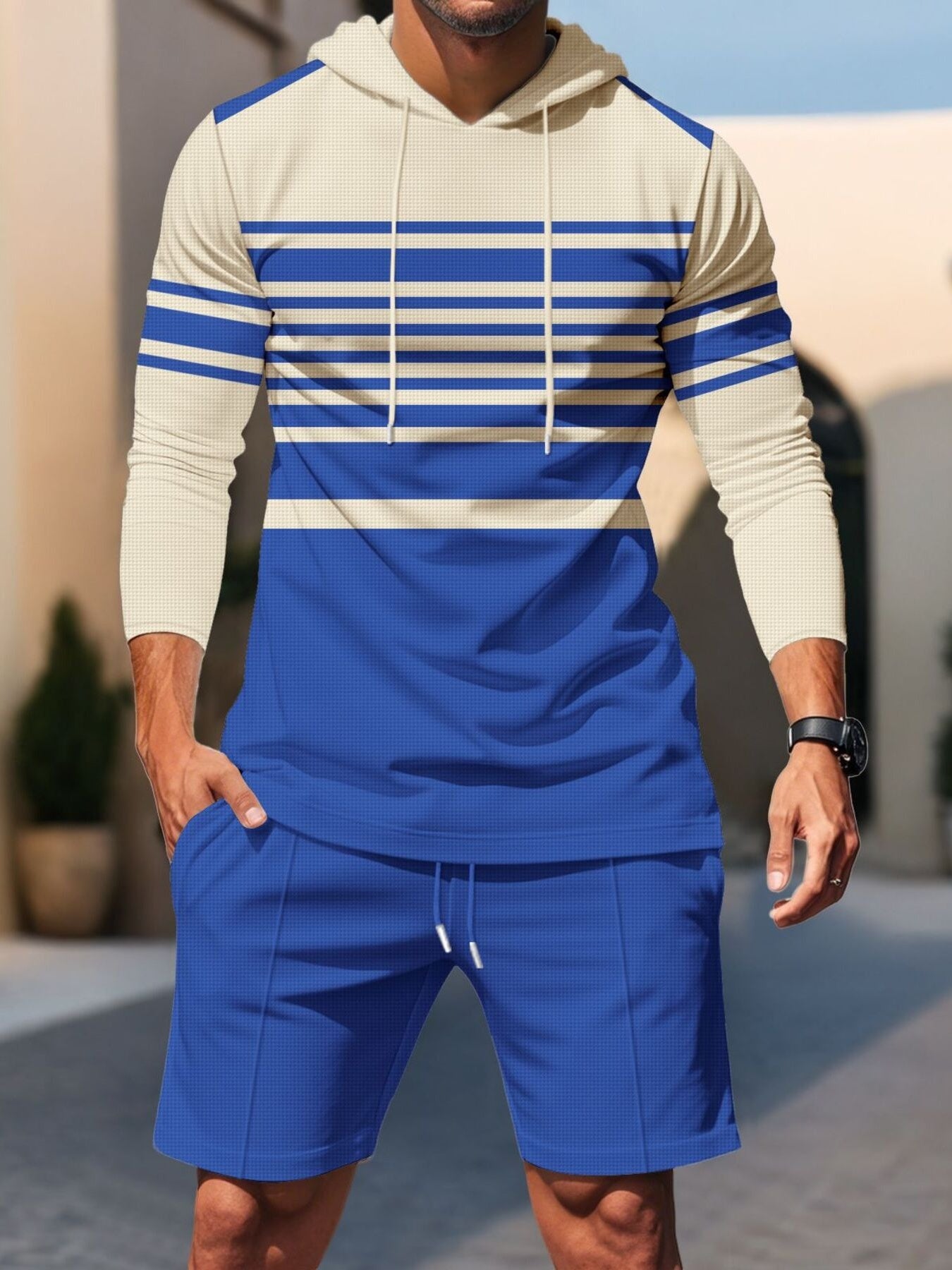Blue and cream striped hoodie and shorts set with drawstring details.
