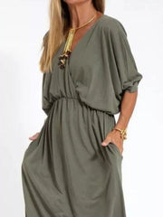 Elegant V-neck maxi dress in Army Green with dolman sleeves and side pockets.