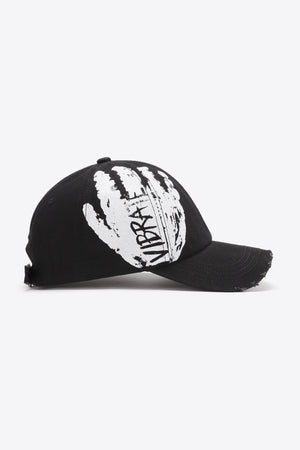Black baseball cap with white VIBRA graffiti hand print and distressed brim.