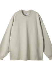 Oversized drop-shoulder crewneck pullover in beige, 100% cotton, long sleeve sweatshirt.