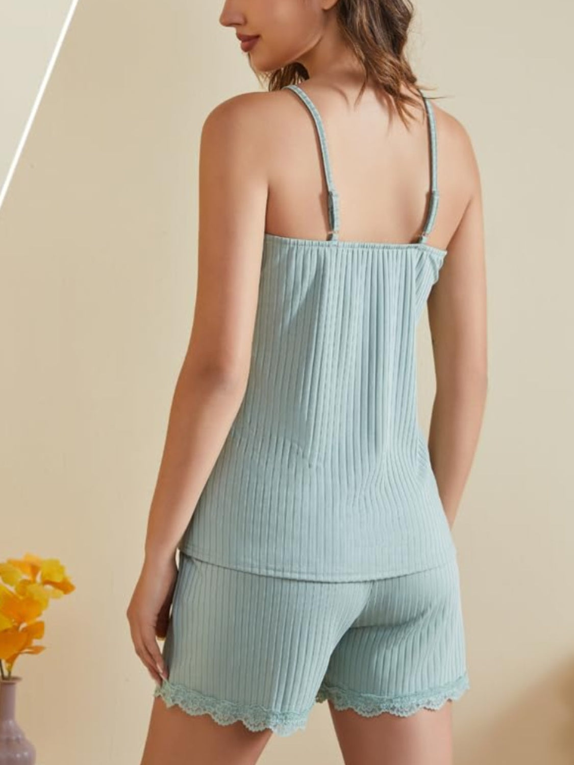 Light blue ribbed cami and shorts set with lace trim detail.
