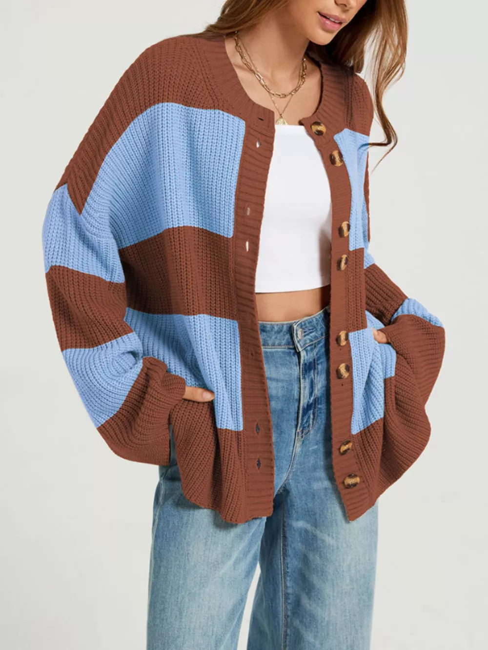 light blue cardigan featuring buttoned and color-block