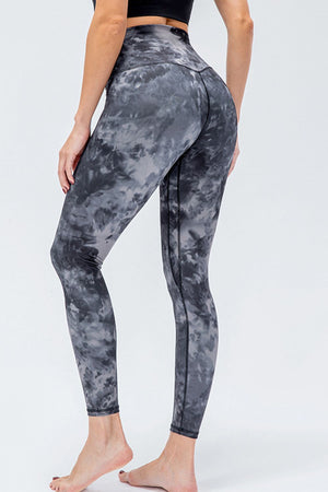 Sculpted high-rise performance leggings in dark gray tie-dye pattern.