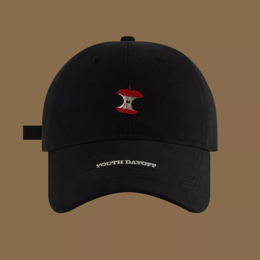 Black baseball cap with embroidered apple core detail and "YOUTH DAYOFF" text.