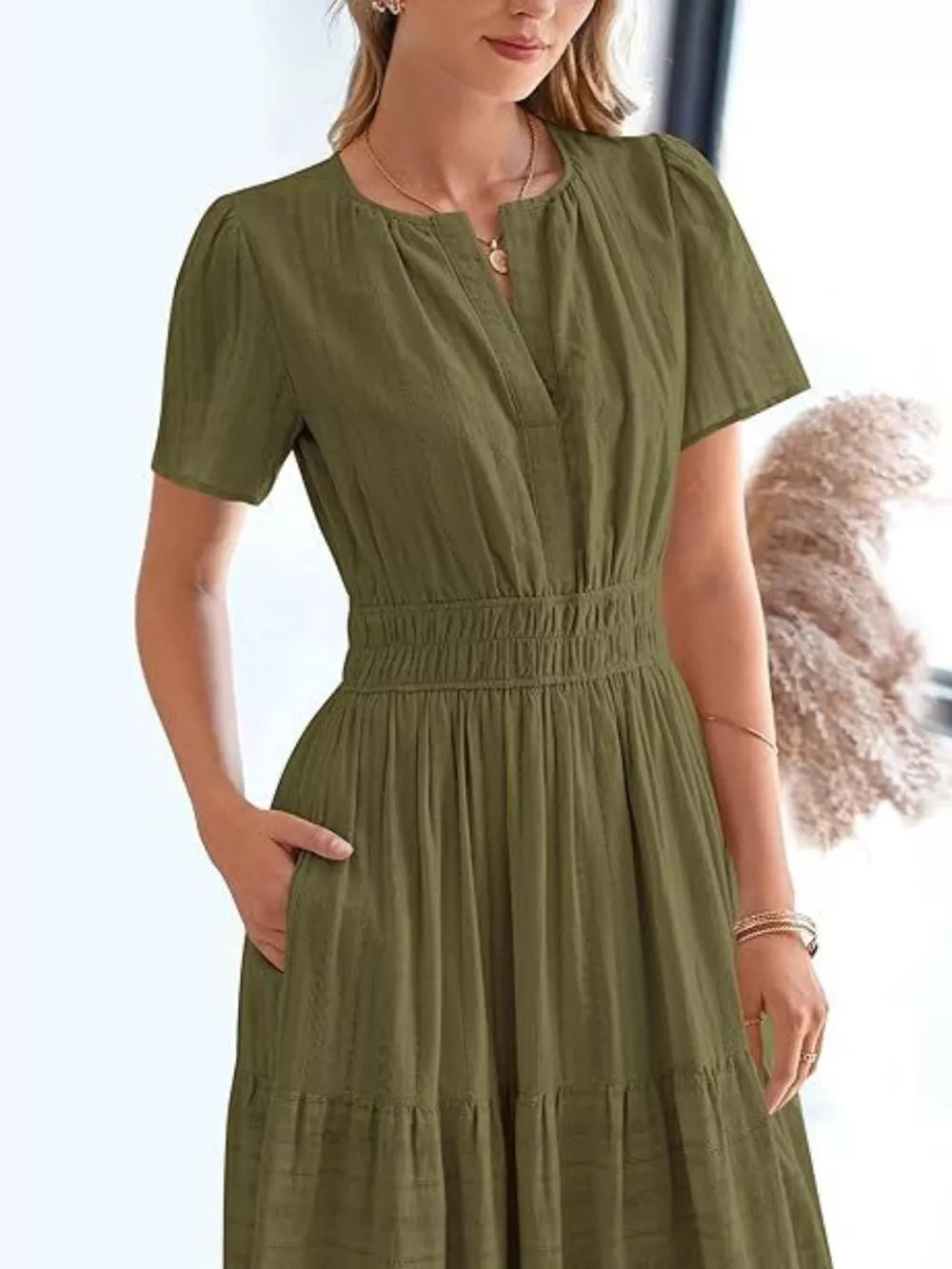 Moss green V-neck tiered midi dress with short sleeves and elastic waist