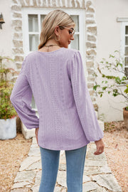 Lavender eyelet yoke blouson sleeve top with allover broderie anglaise detail.