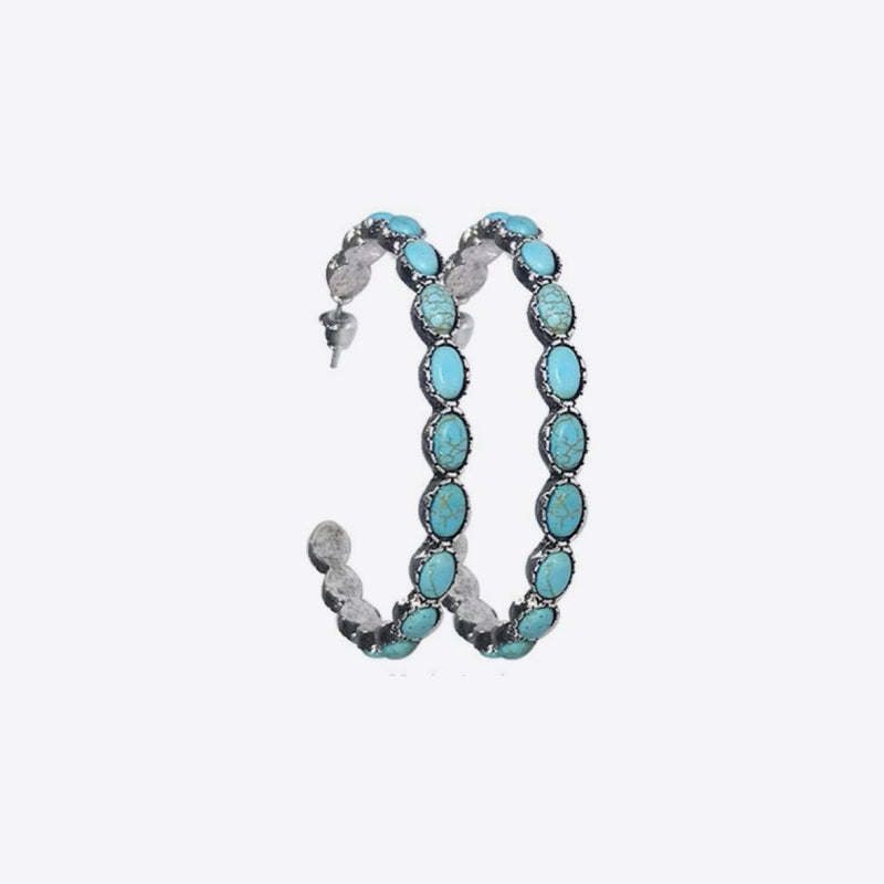 Textured turquoise stone hoop earrings with silver alloy setting.