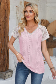 Blush pink eyelet raglan blouse with white lace short sleeves and V-neck.