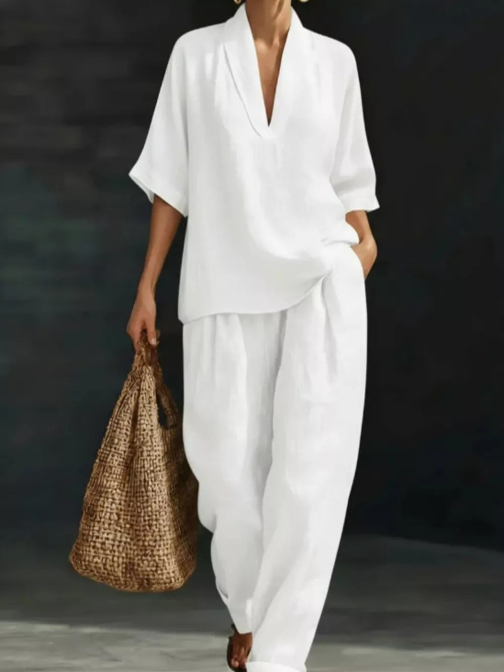 White half-sleeve top with V-neck and wide-leg pants set, casual women's outfit.